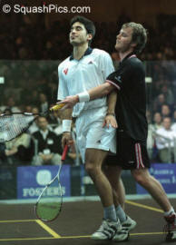 http://www.squashpics.com/toc2003/TOC15%20Nicol%20reads%20Lincou%27s%20game%20too%20well%203912.jpg